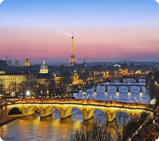 Bridge over the Seine and the Eiffel Tower at dusk